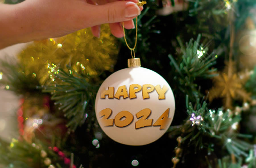 Christmas ball with the word HAPPY 2024 in yellow